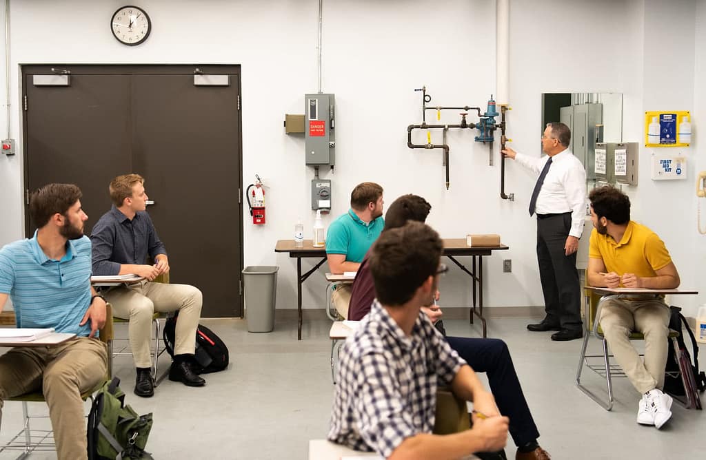 Dr. Joel Porcher teaching a class.