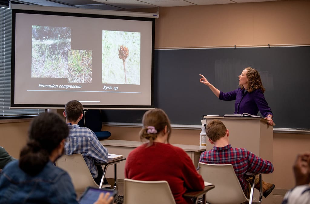 Dr. Watson teaching in class
