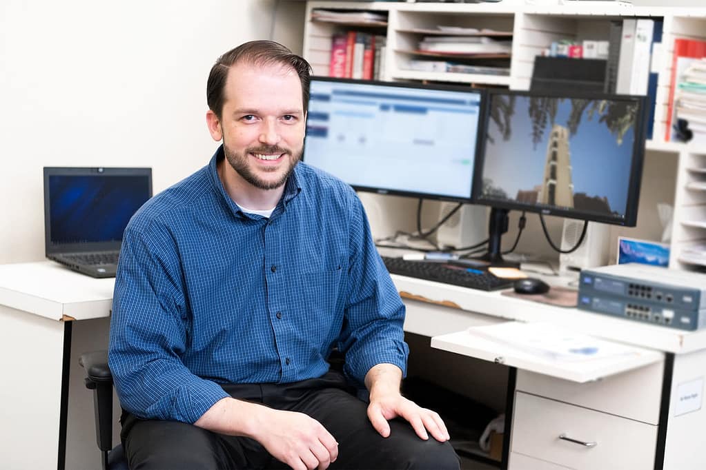 Wayne Sielger at his IT desk