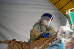 Shannon Wood treating a patient in Italy.