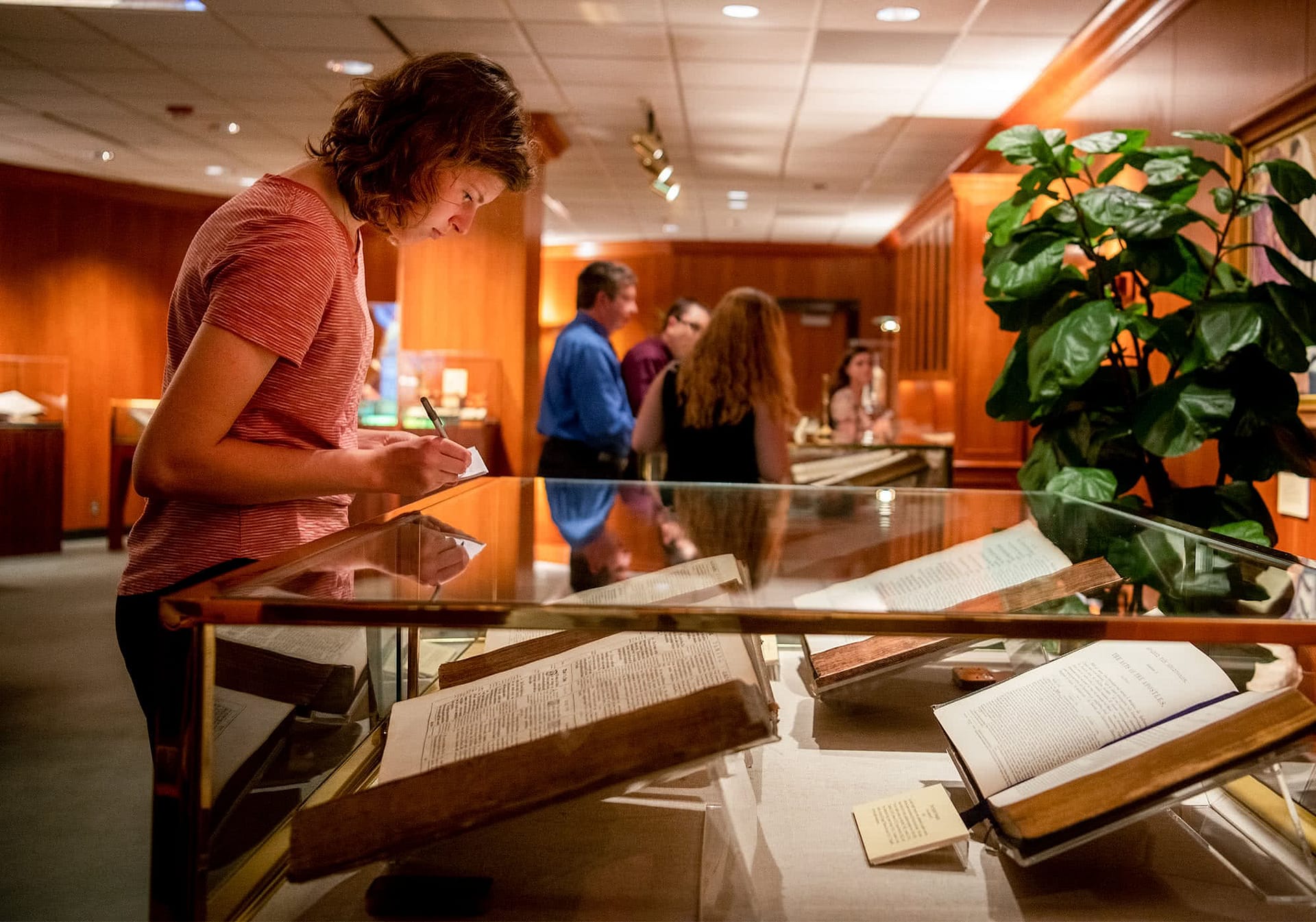 Lady viewing manuscript