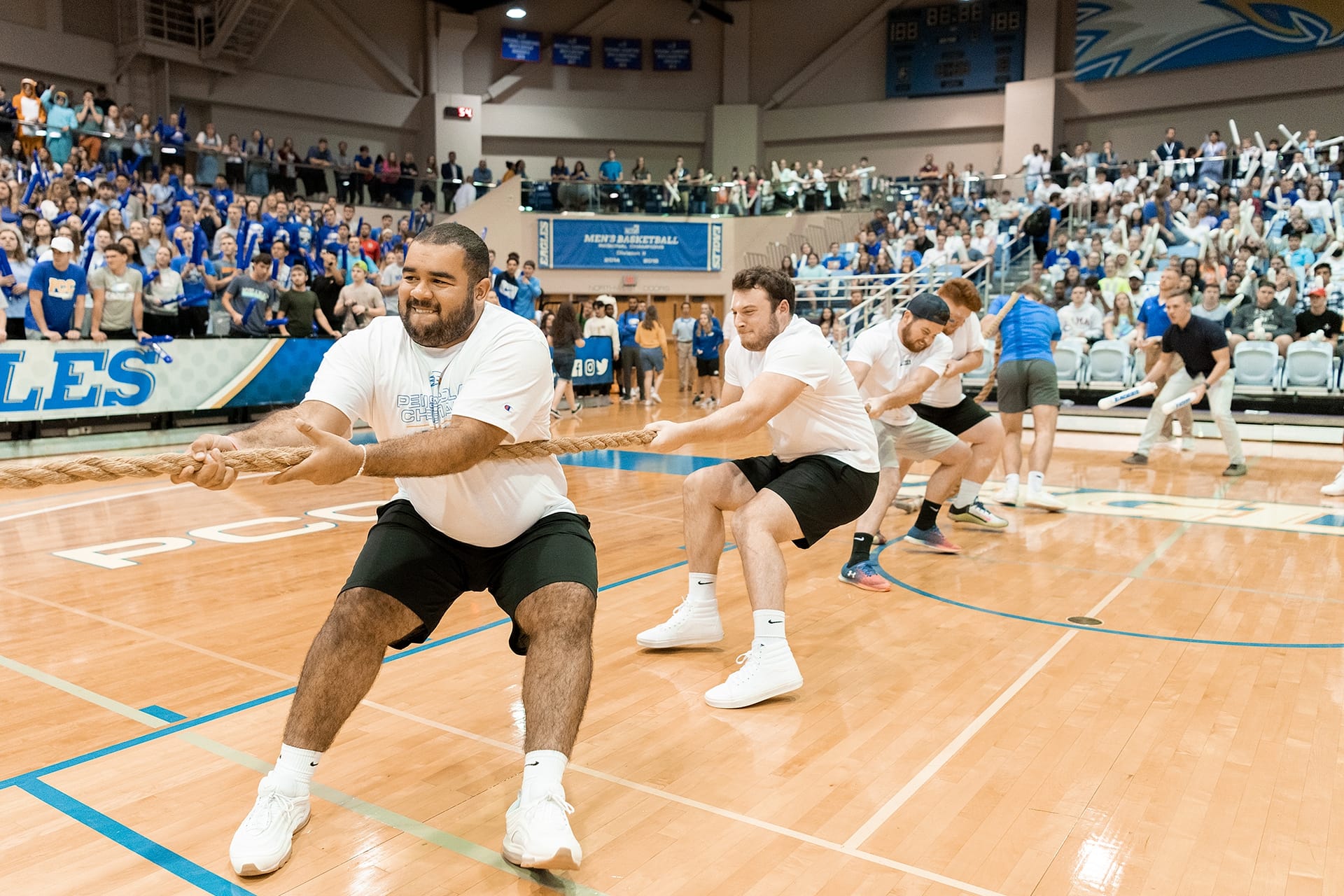 Students playing tug of war.