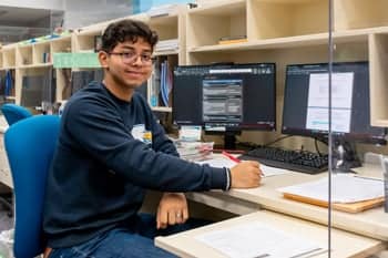 Summer student worker working at Abeka
