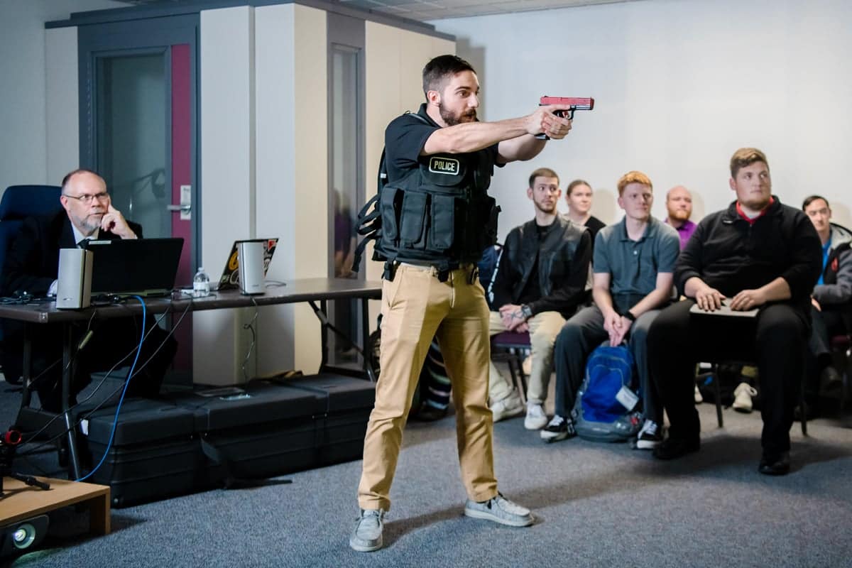 CJ-Academic-MILO PCC Students practice shooting a target in a criminal justice class.
