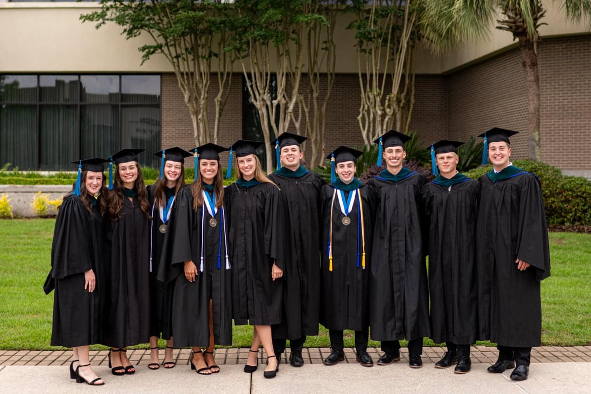 Graduates pose for a photo at the PCC Commencement 2025