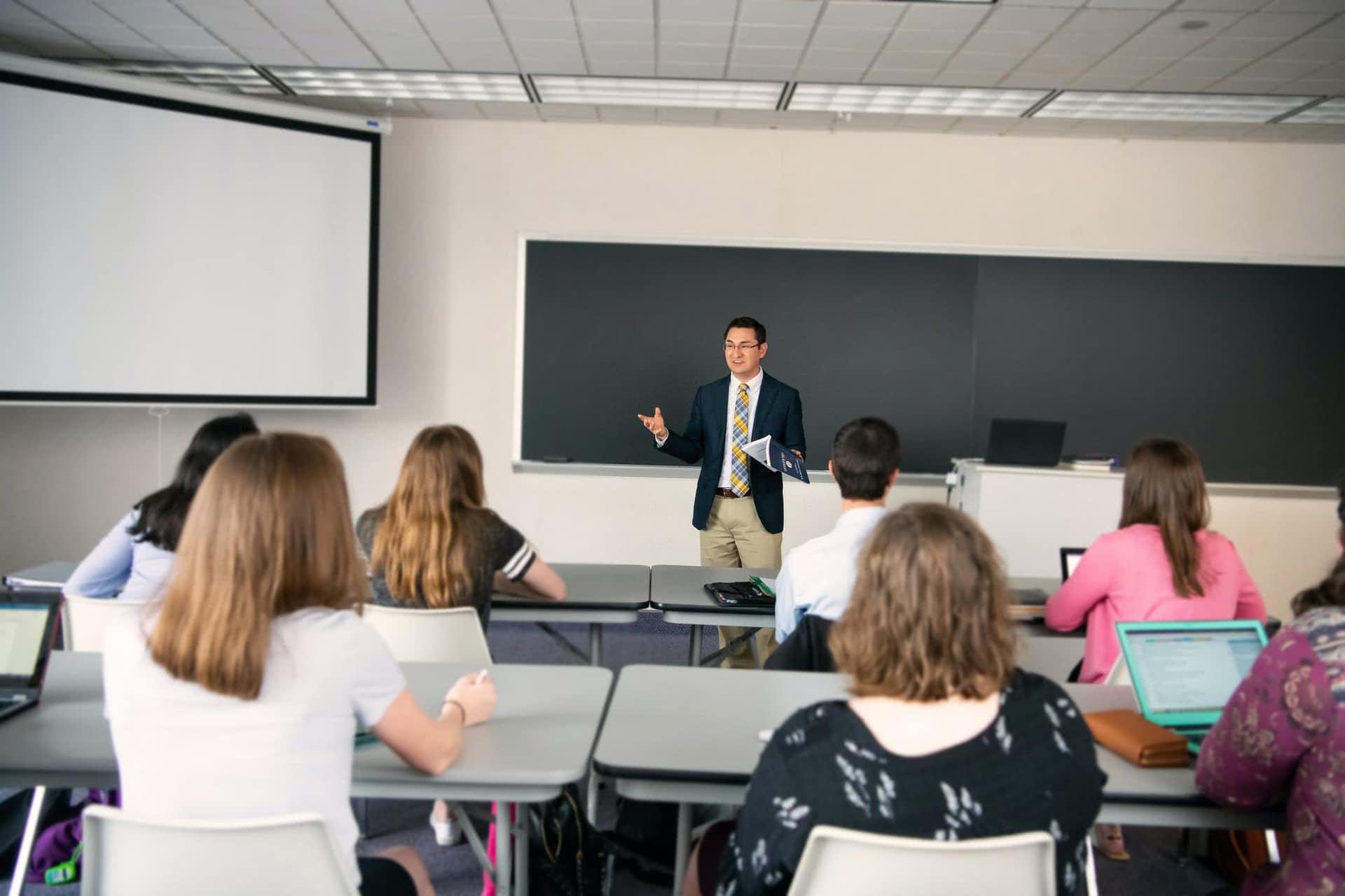 Mark Wainwright speaking to a class of students.