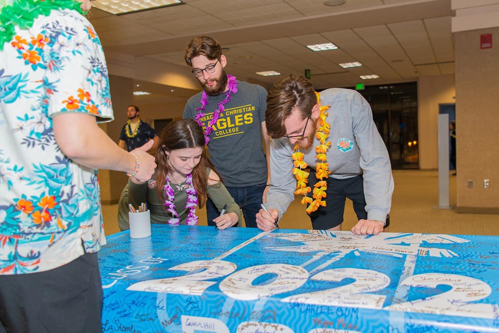 Seniors signing banner