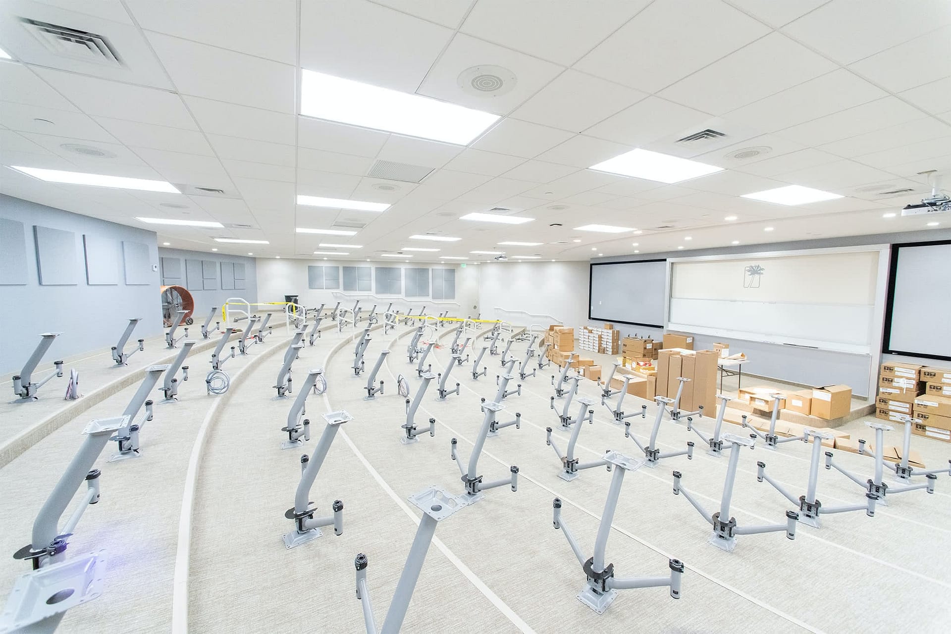 Desks and chairs being put into Lyceum.