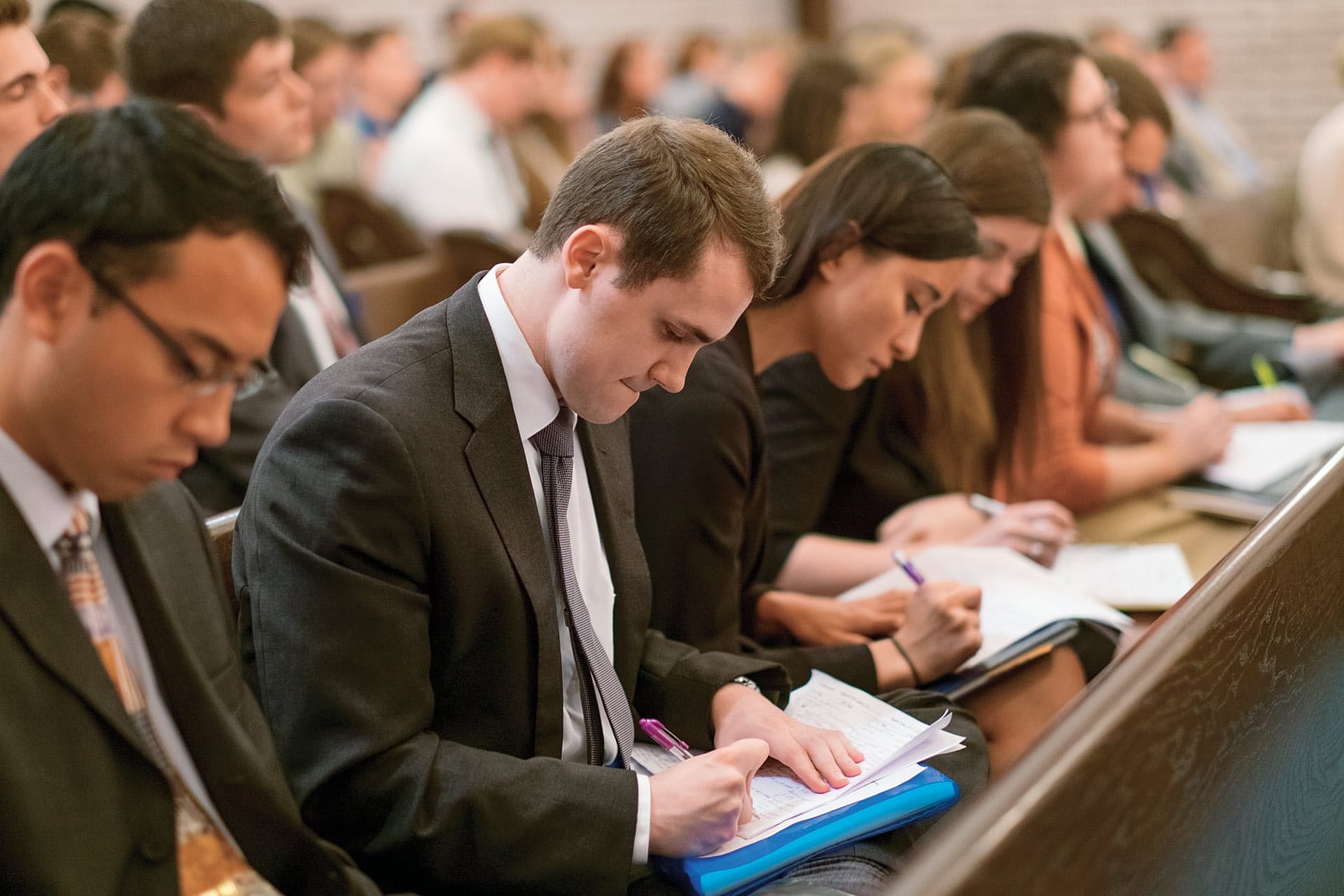 Students taking notes.