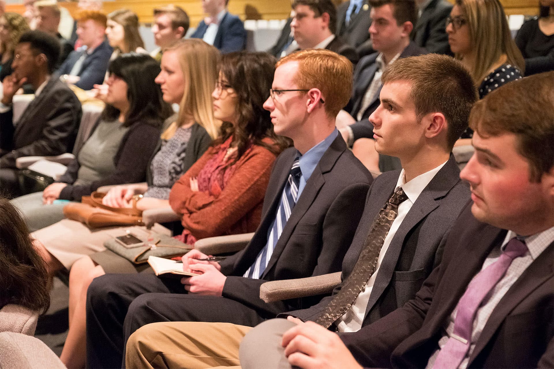 Students listening to presentation.