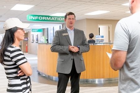 Jon Tutton speaking with guests