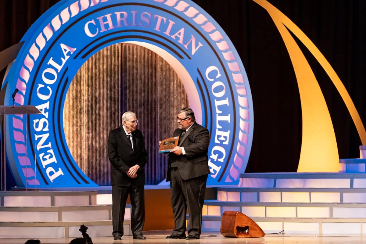 gala50th-horton-award Dr. Shoemaker awards a memorative plaque Dr. Horton