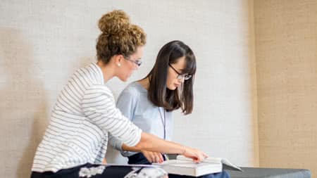 Student tutoring another student