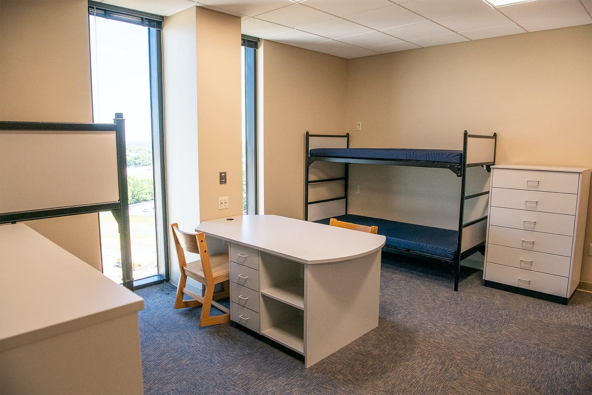 A furnished dorm room in Rice Tower. 