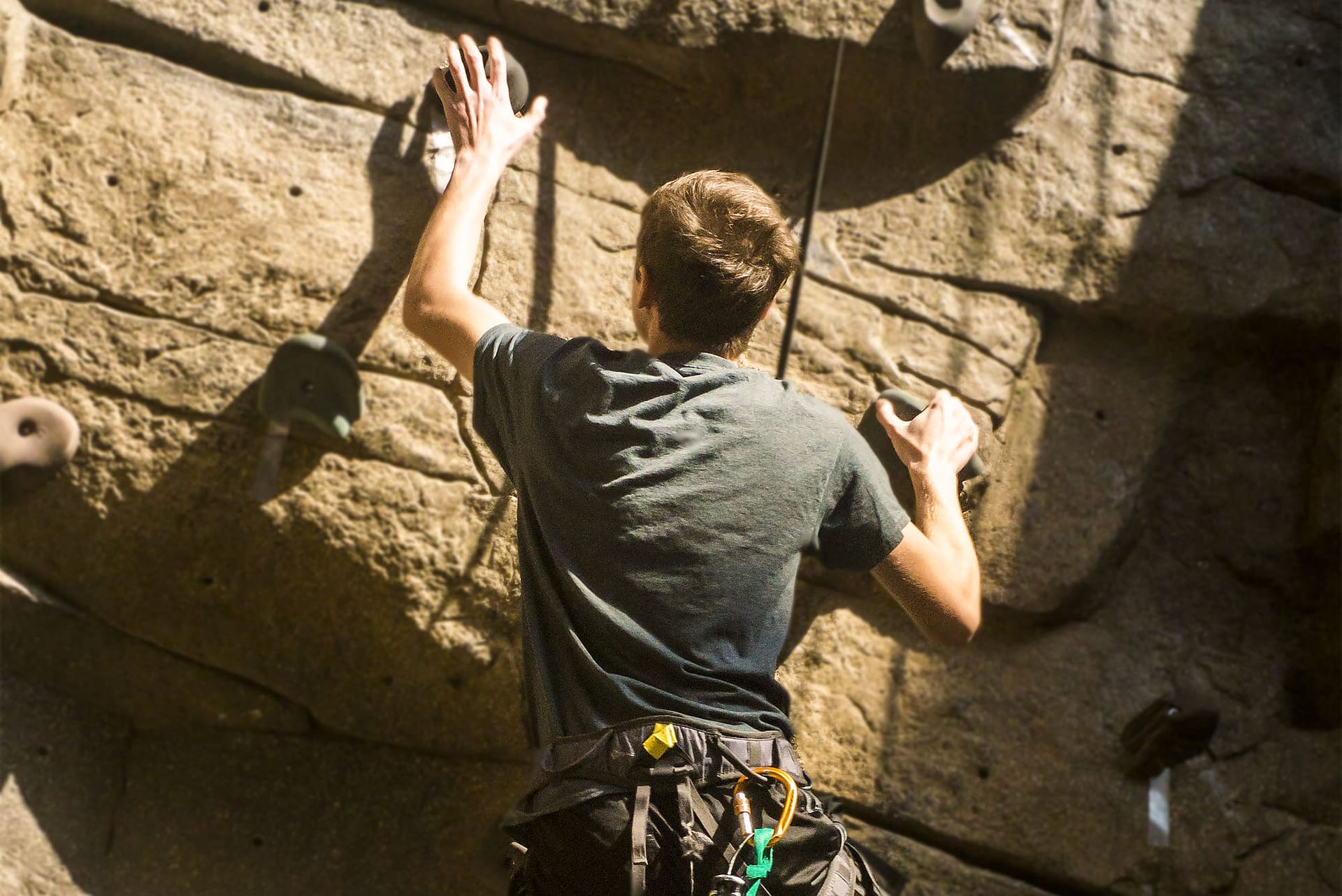 Someone rock climbing.