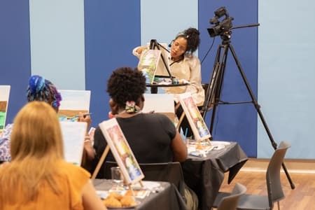 Kimberly Hawkins teaching painting