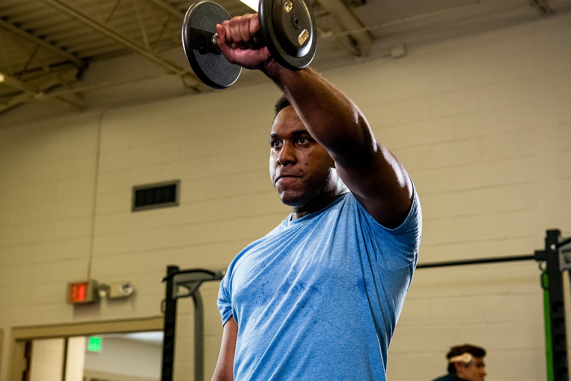 someone lifting weights.