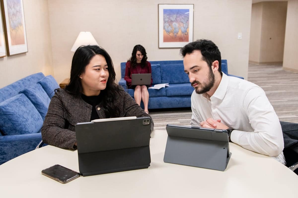 grad-students-studying Graduate Students collaborate and study together