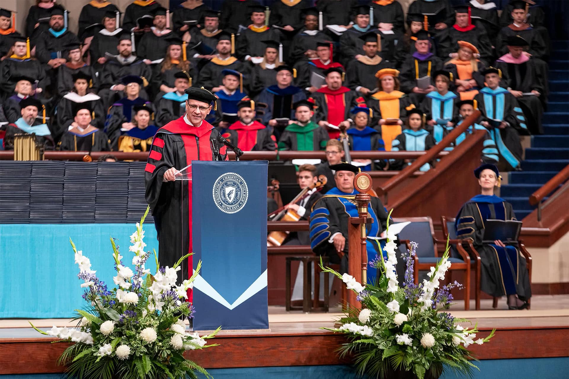 Pastor Redlin addresses the graduates