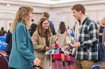 PCC Students talk with a representative at the PCC Career Fair.