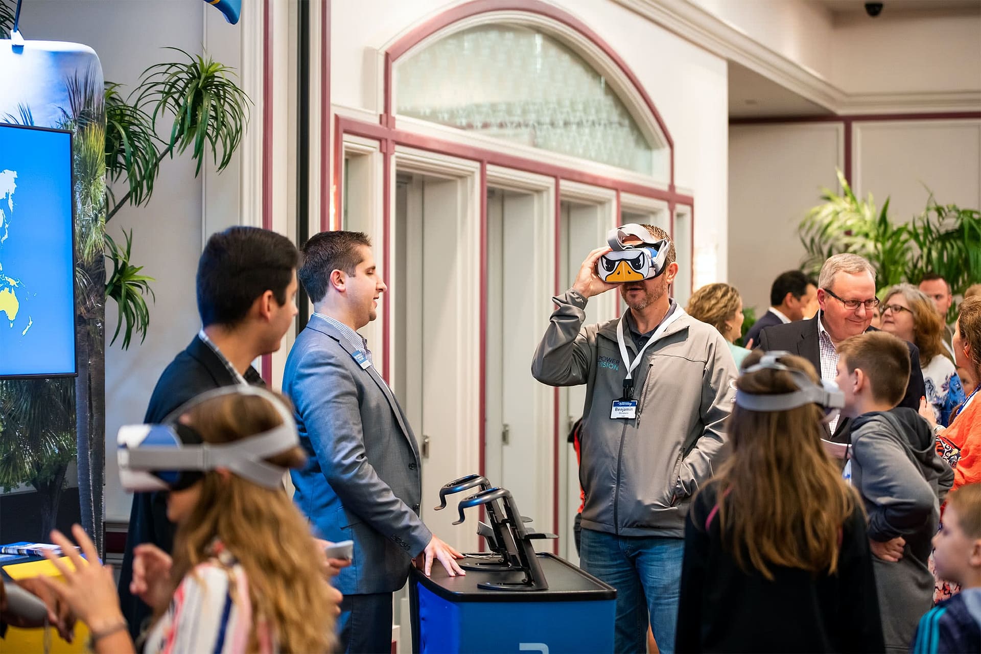 PCC Alumni playing with Oculus.