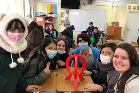 YOM team members with students from Chile