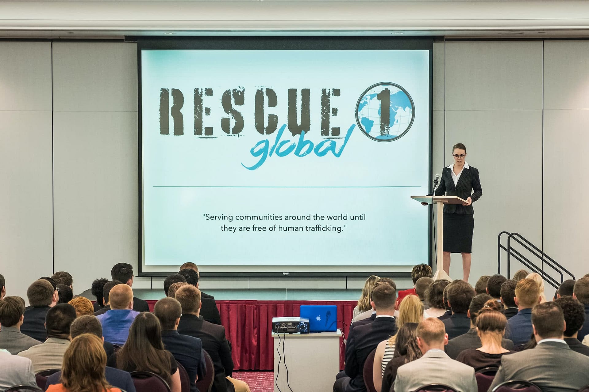 Woman giving presentation.