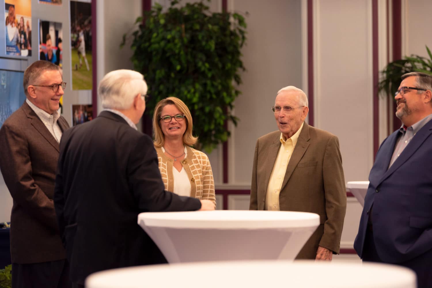 shoemaker-talking-with-alumni Alumni talking together.
