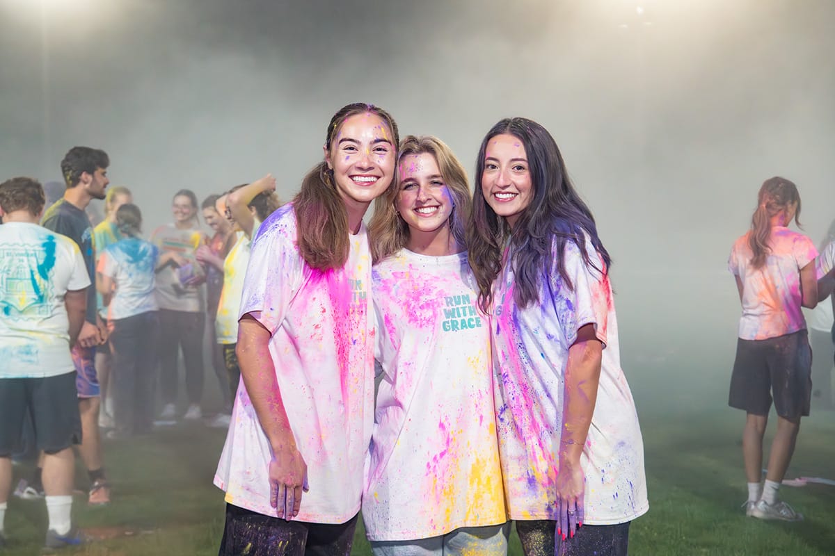 Friends celebrating with chalk powder