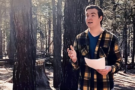 Nathan Carlson practicing a speech while finishing the spring semester from home.