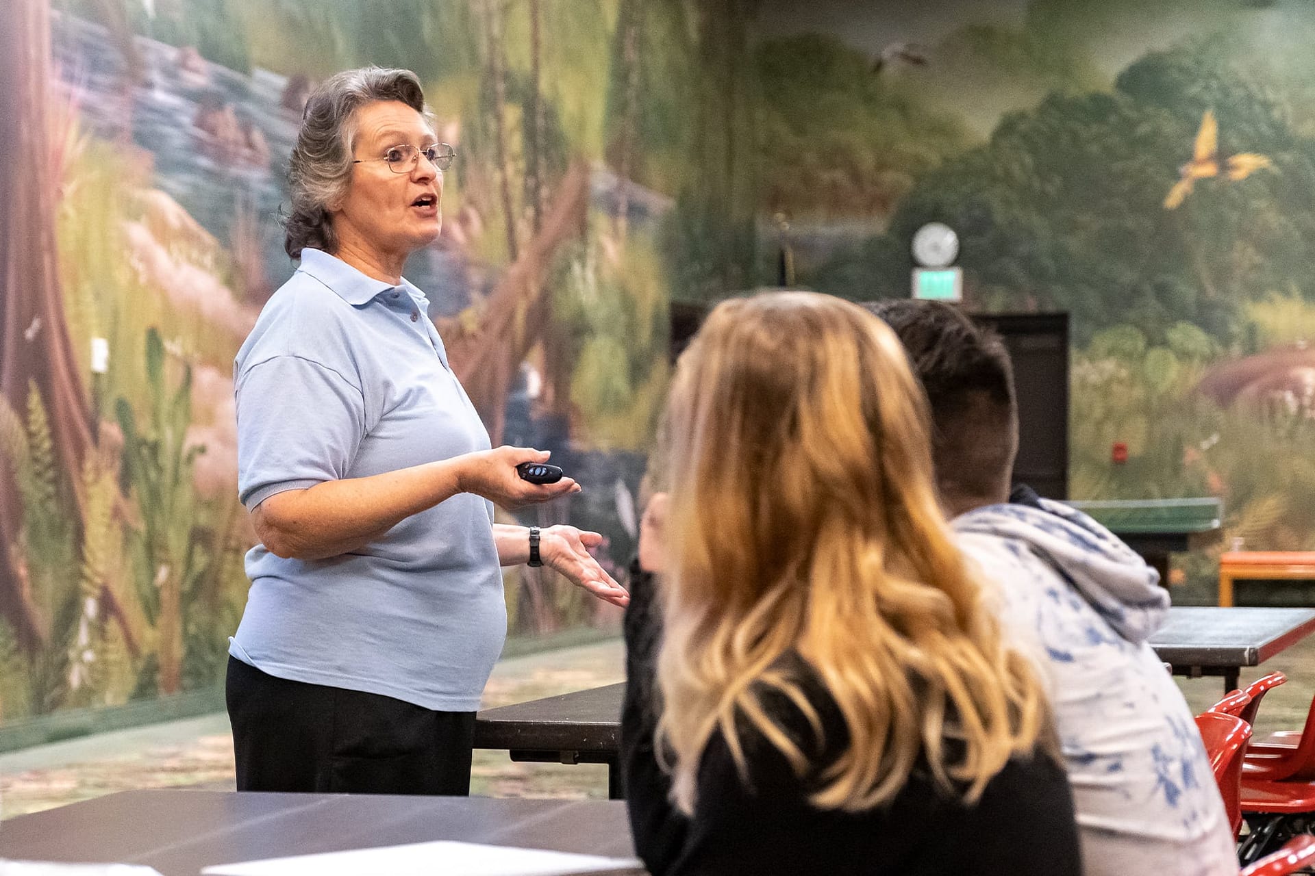Dr. Waters speaking to students in a wilderness first aid class.