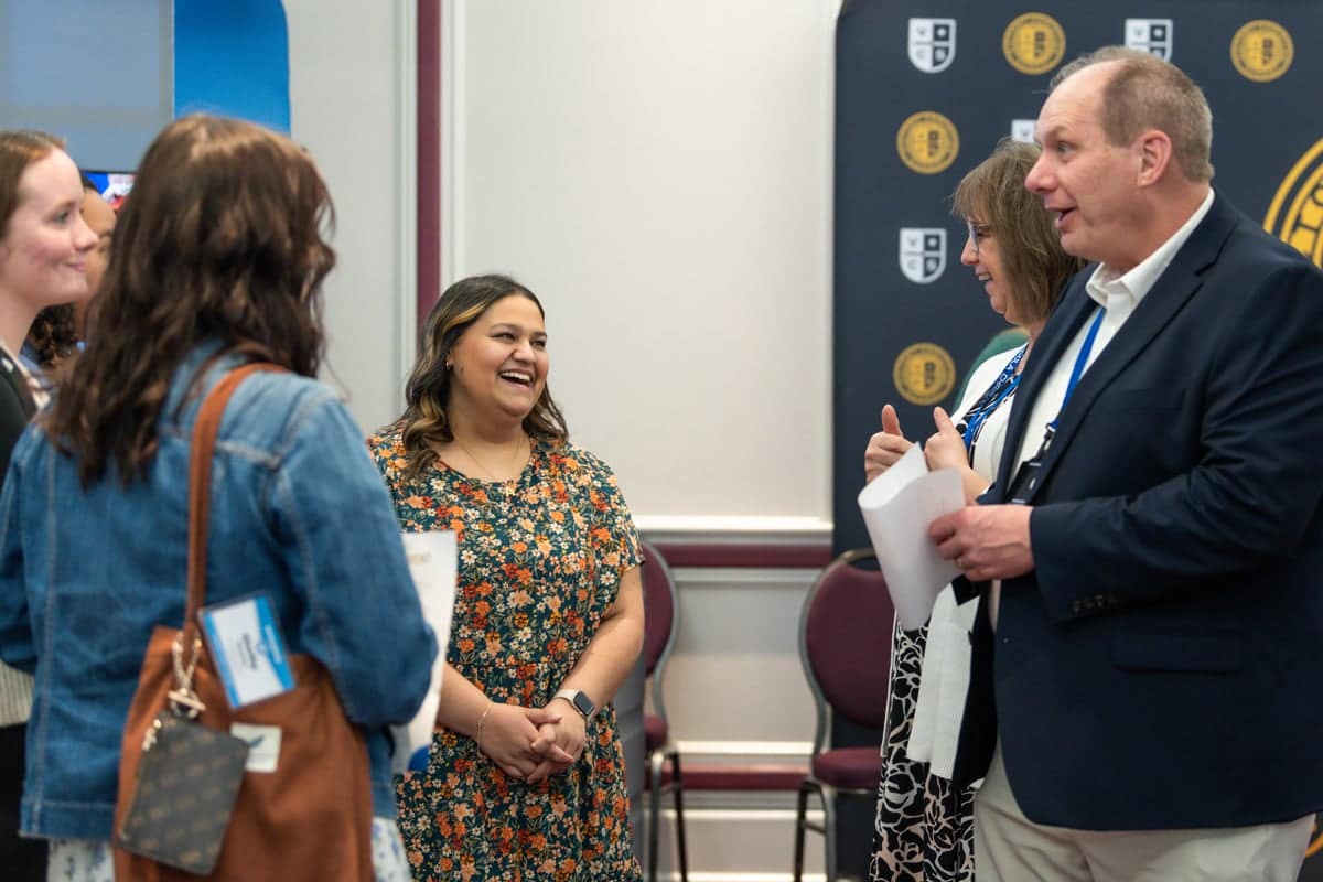 Students talk to recruiters at PCC's Educator Recruitment event