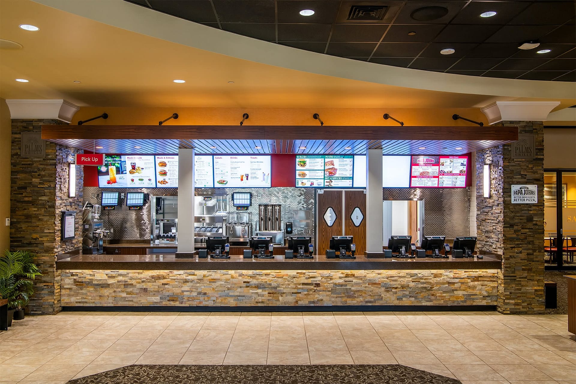 Front view of Chick-fil-A, Palms Grille, and Papa Johns after renovation construction.