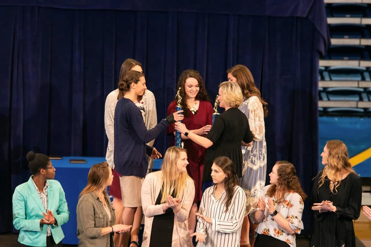 Students being awarded at the Eagles Award Banquet