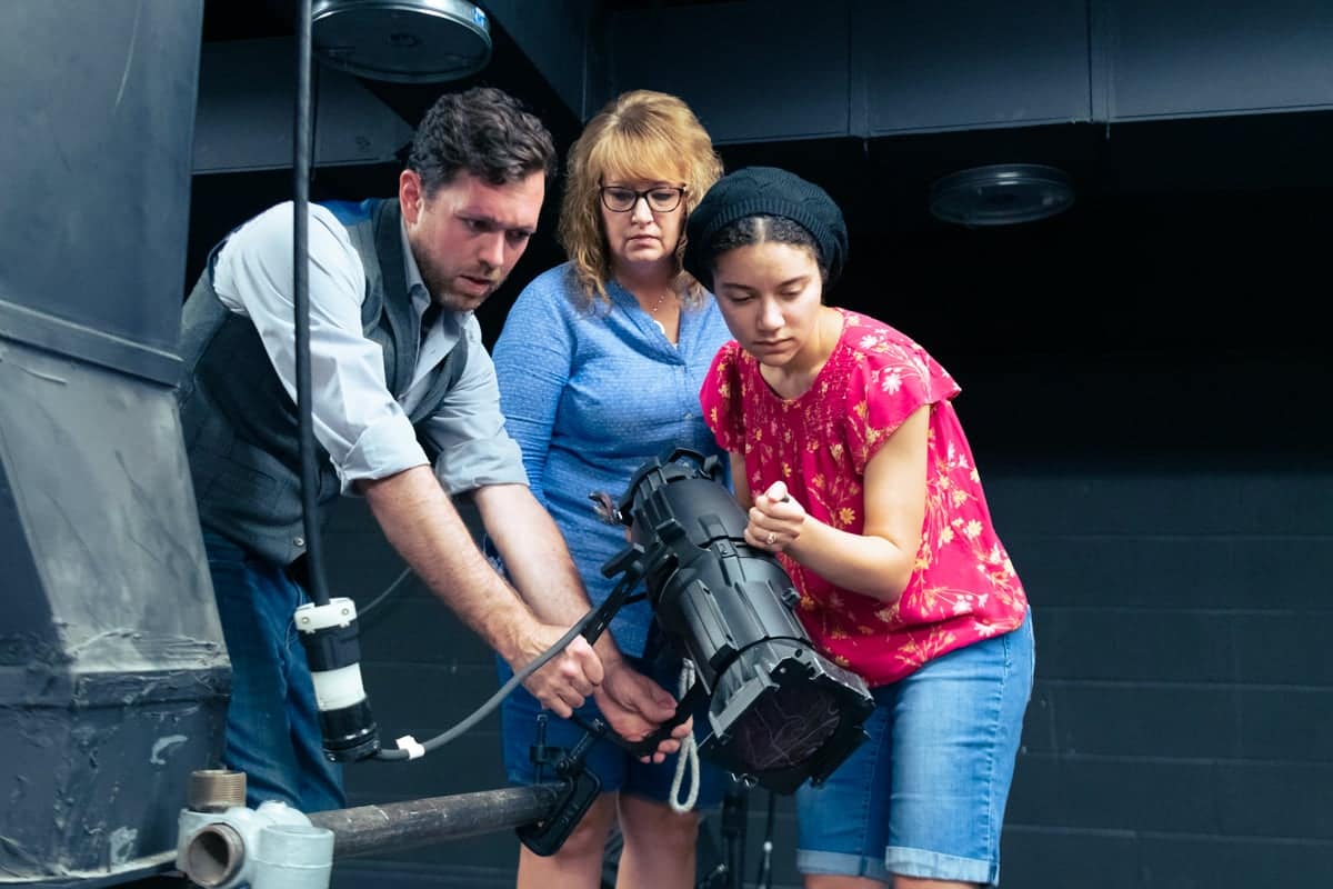 grad-DP Graduate students behind the scenes of a Dramatic Production set