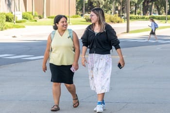 Students walking on campus.