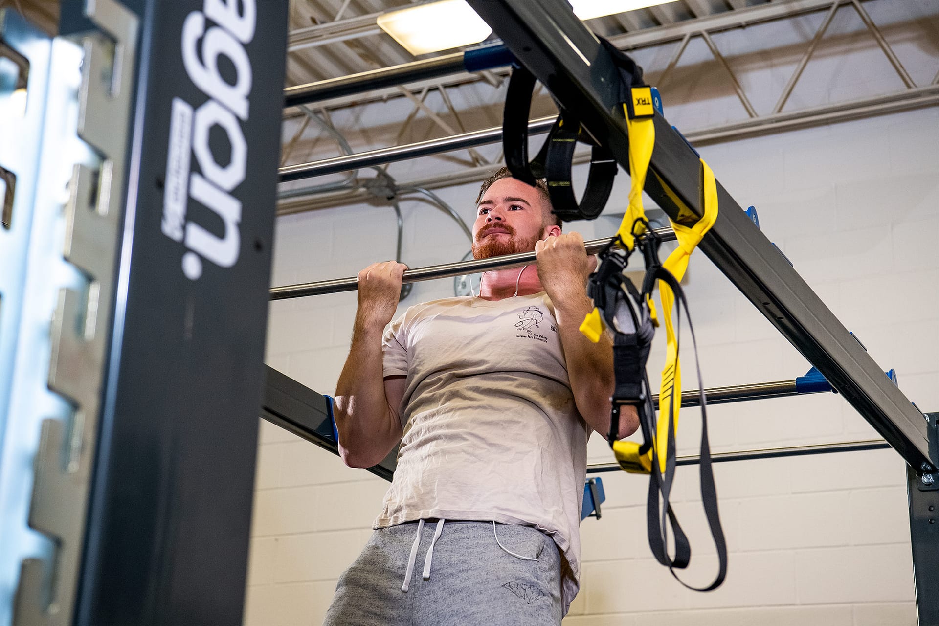 Someone doing pullups.