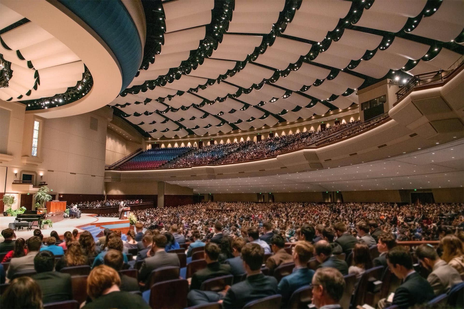 The Crowne Centre is full of students, faculty, and staff listening to Johnny Pope at Bible Conference