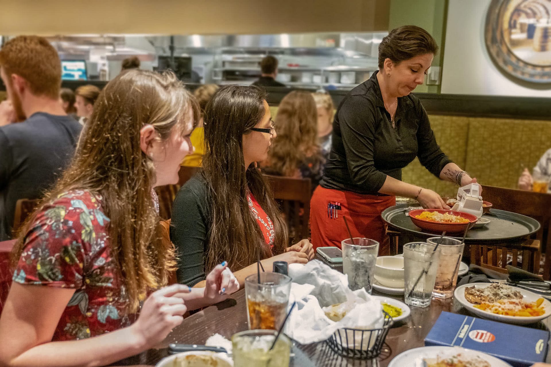 Students waiting on their meal at Carabbas.