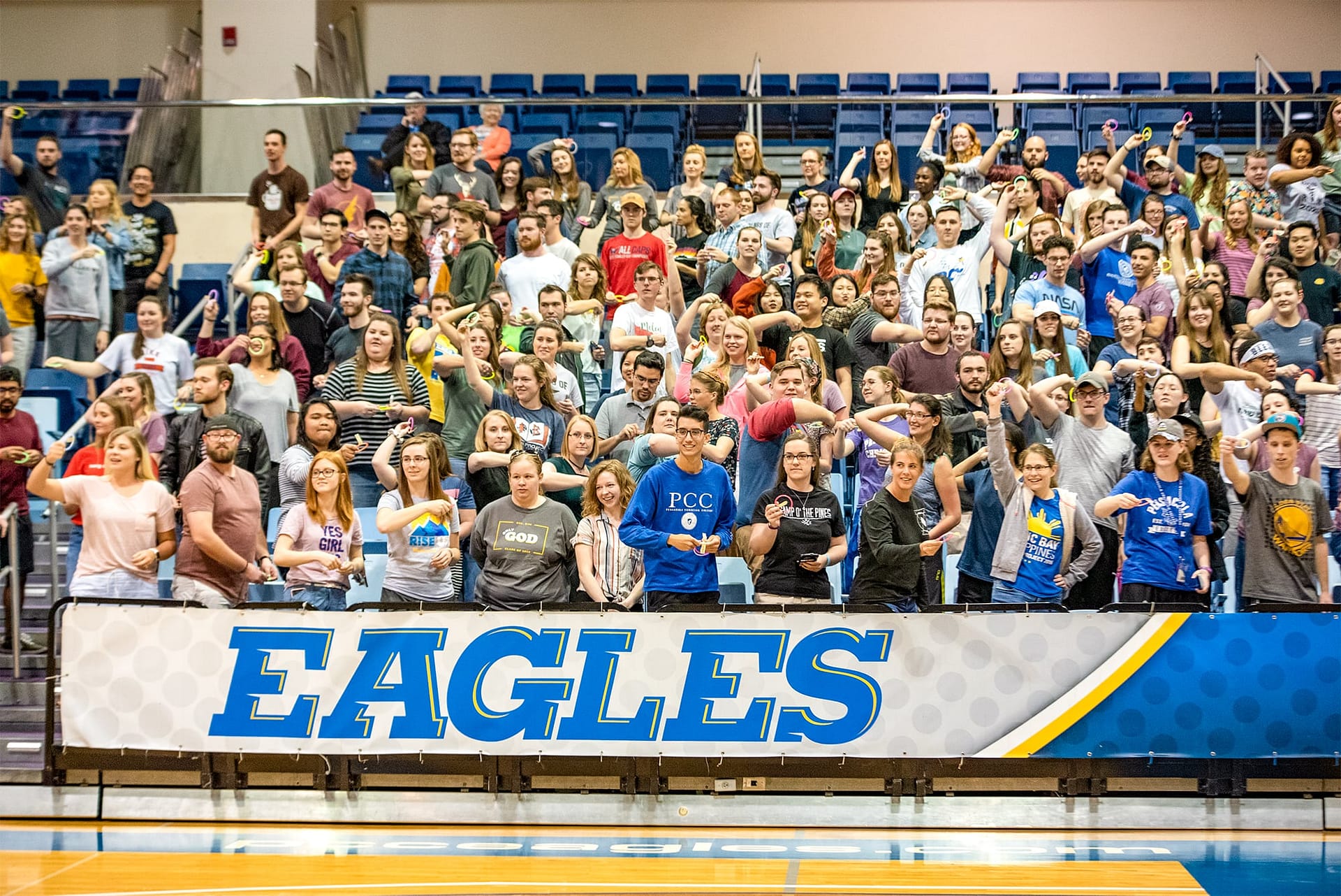PCC students standing on Sports Centre bleachers.