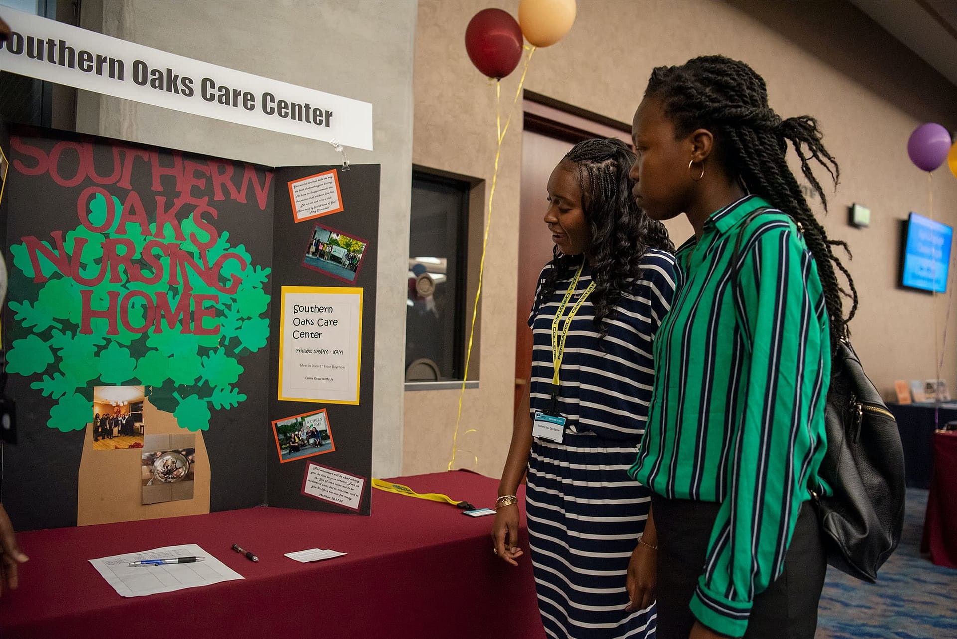 Two girls consider volunteering at Southern Oaks Care Center
