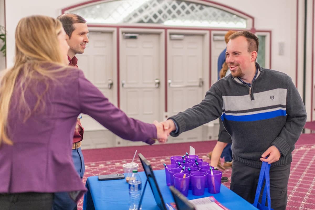 PCC Student visits Employer representative booth at the PCC Career Fair.