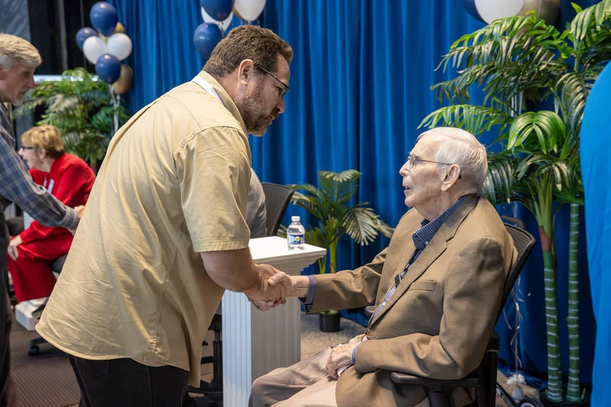NR-Alumni-Homecoming-Slideshow-2 Dr. Horton shaking hands with alumnus