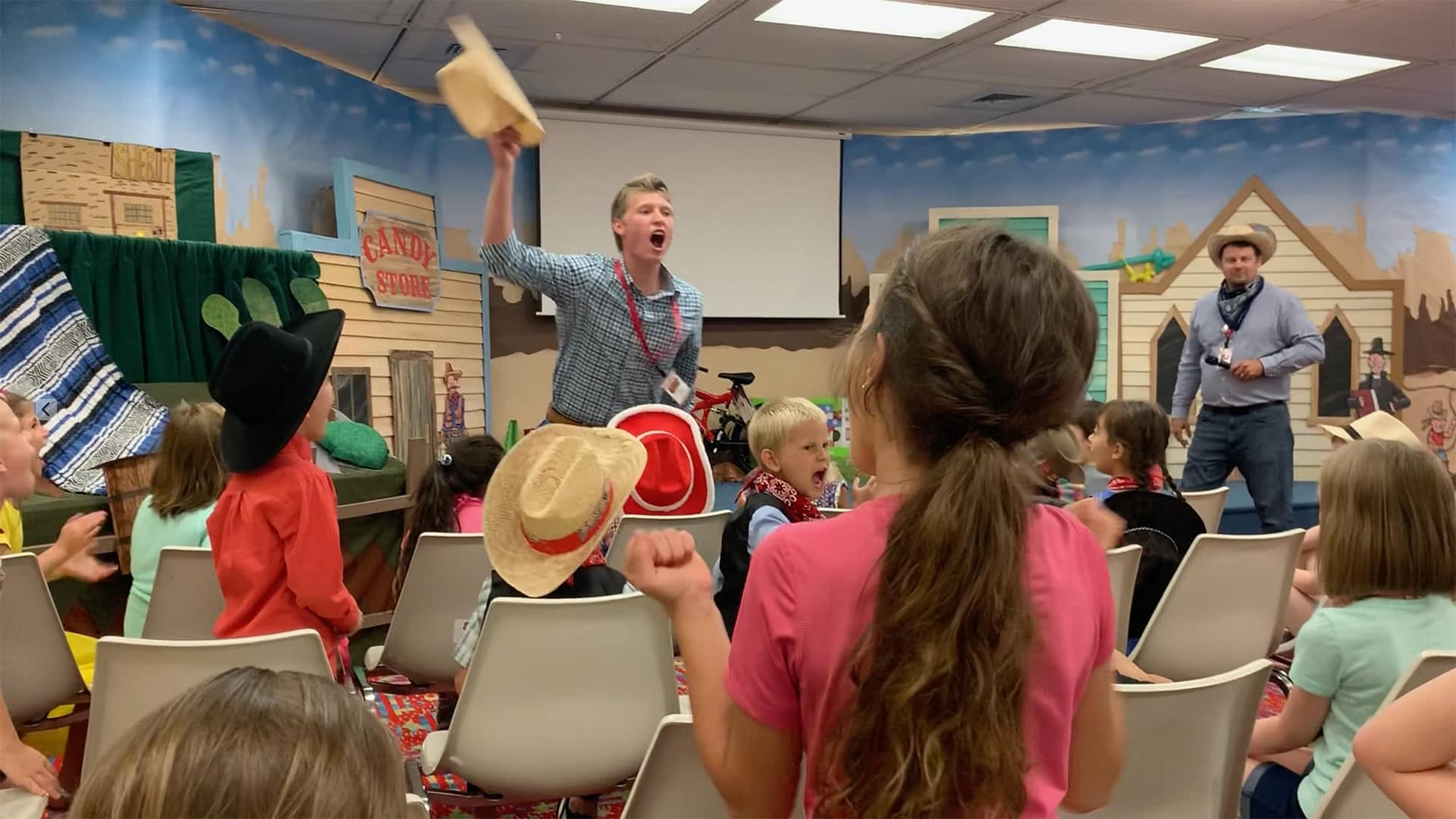 John Tilley leading children at Campus Church VBS.