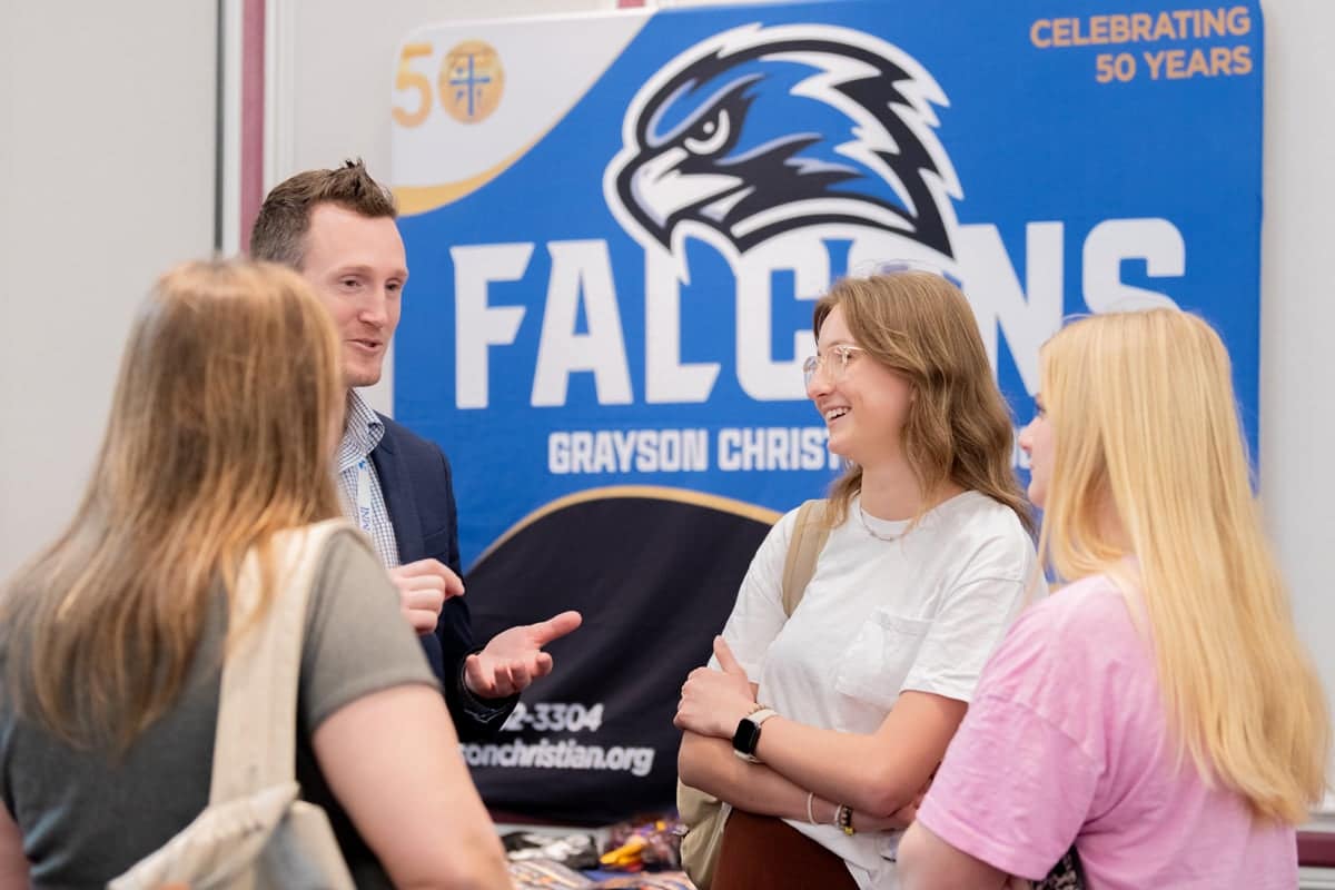 Students talk with a recruiter at PCC's Educator Recruitment event