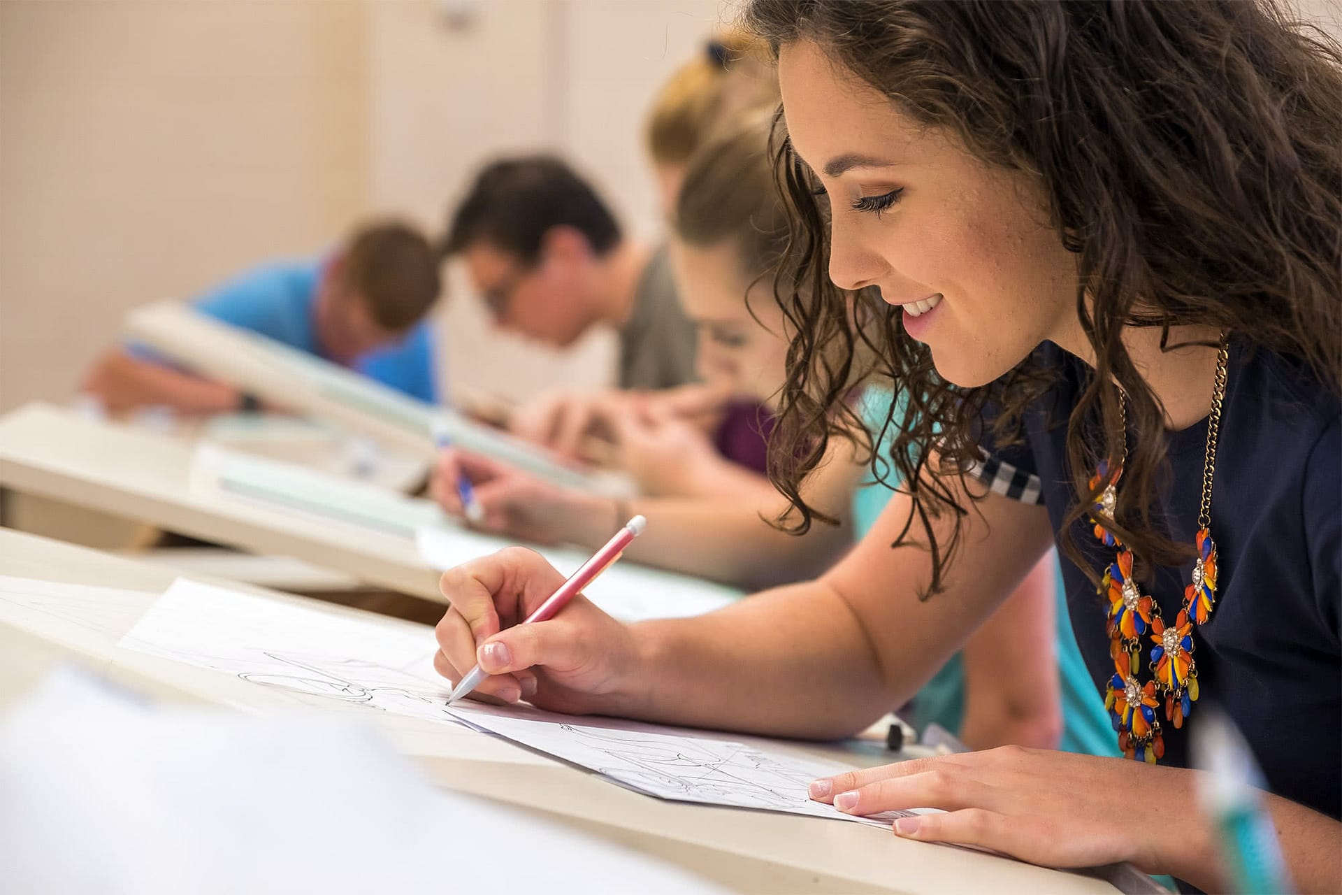 A freshman Visual Arts student hones her drawing skills in Principles of Drawing