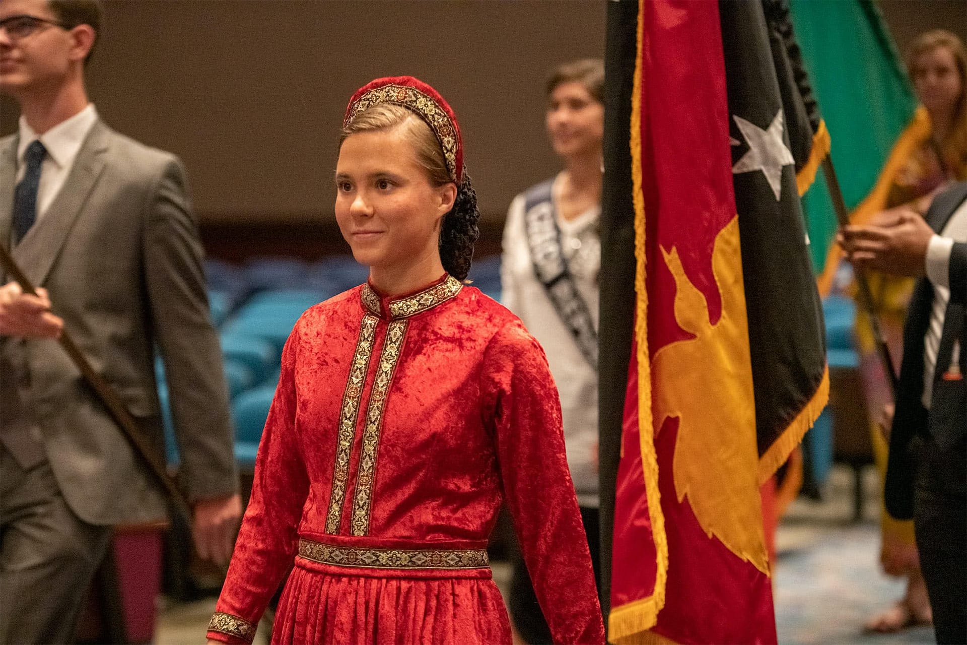 A female PCC students representing her hoe country in the Parade of Nations.