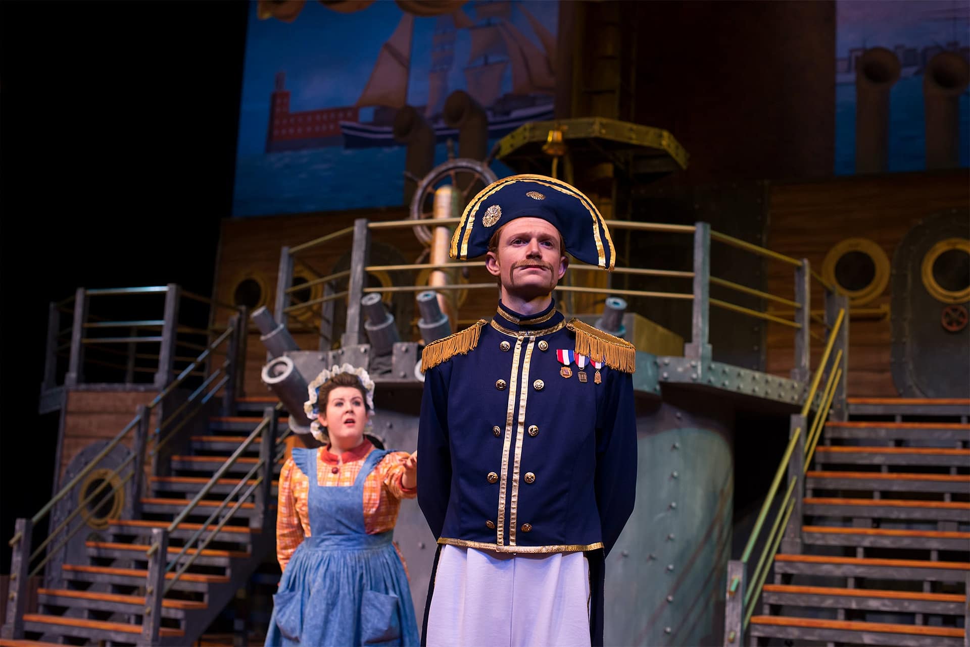 Pinafore Captain and woman.
