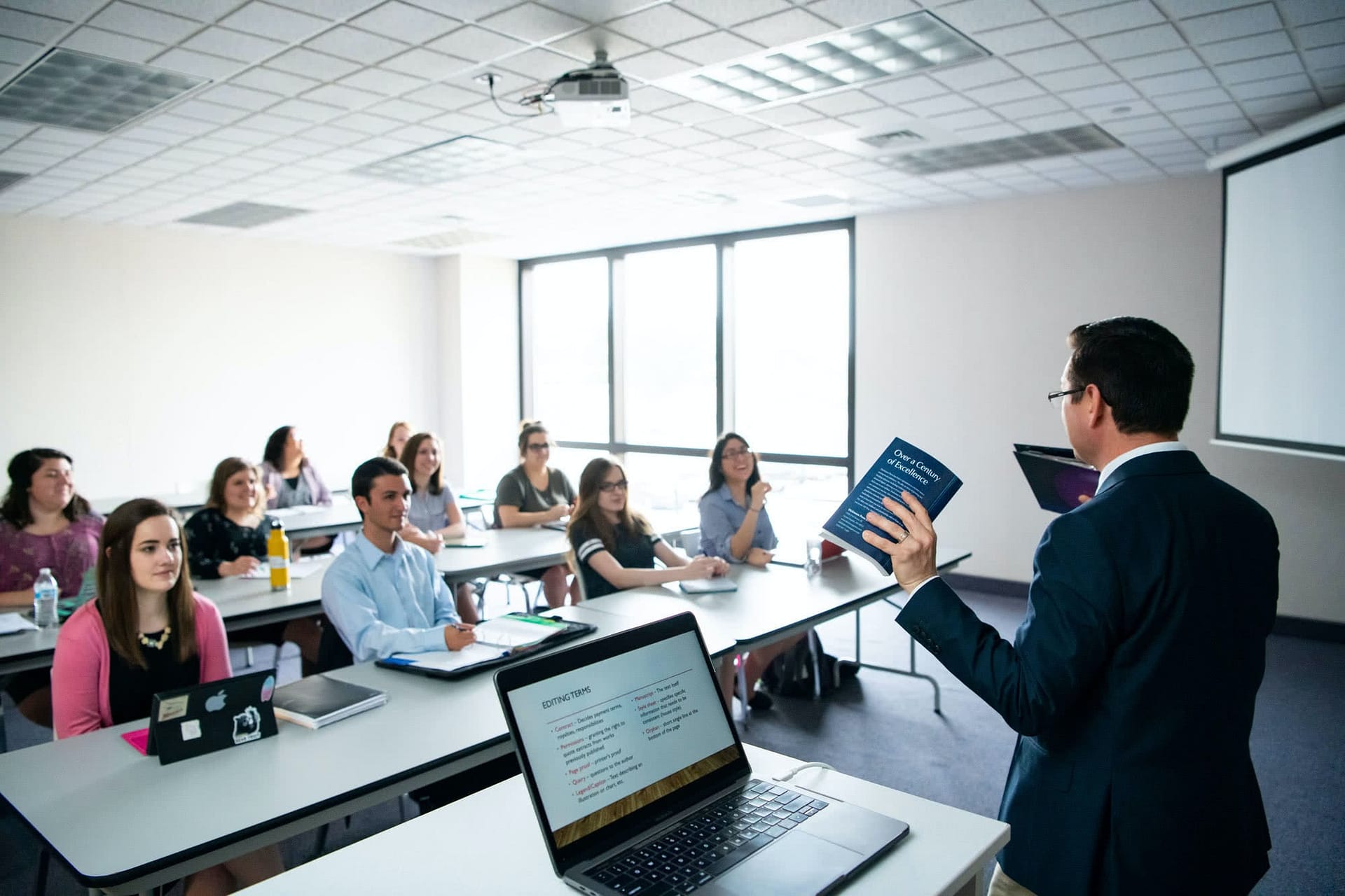 Mark Wainwright teaching a class of students.
