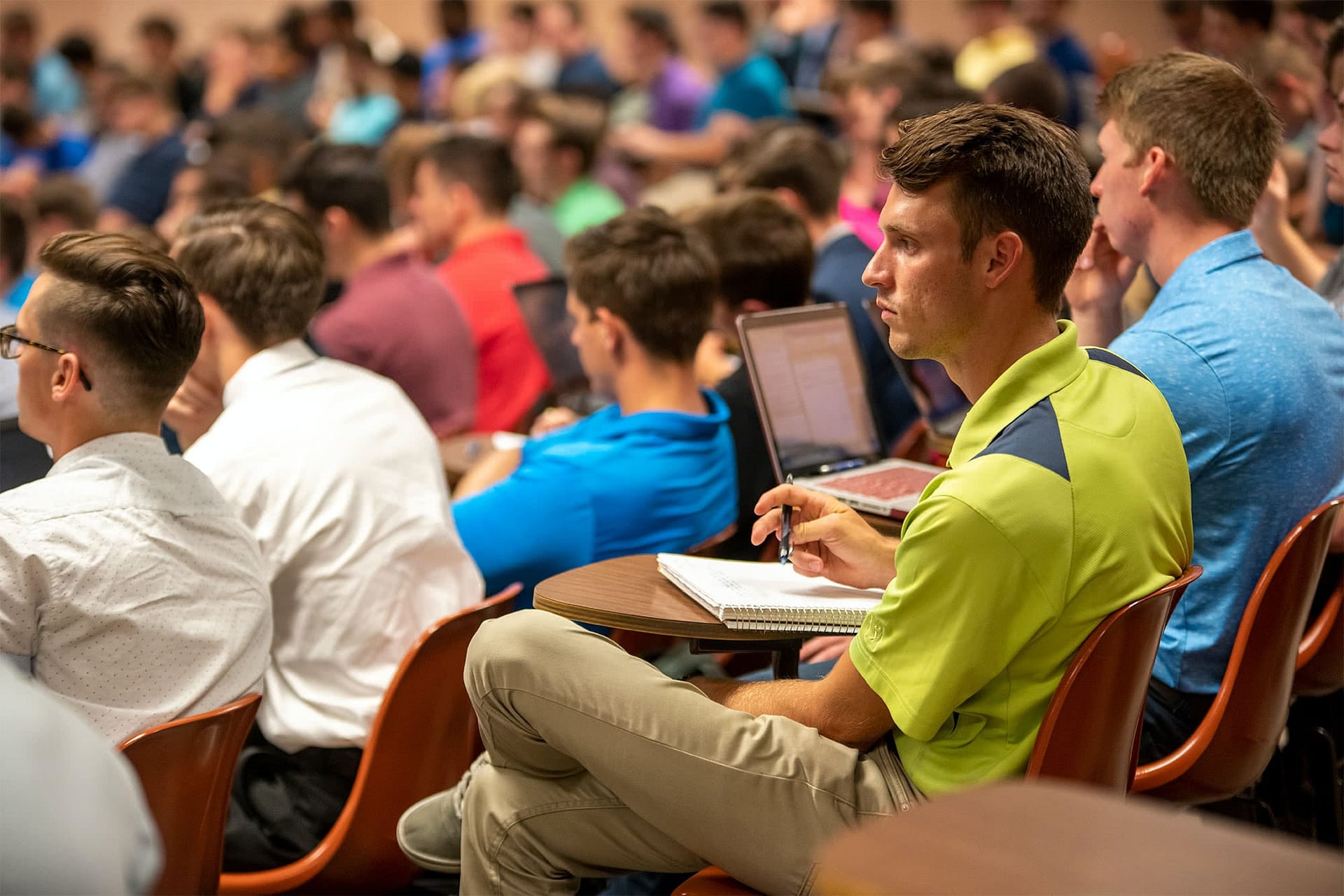 Students listen and take notes during the class